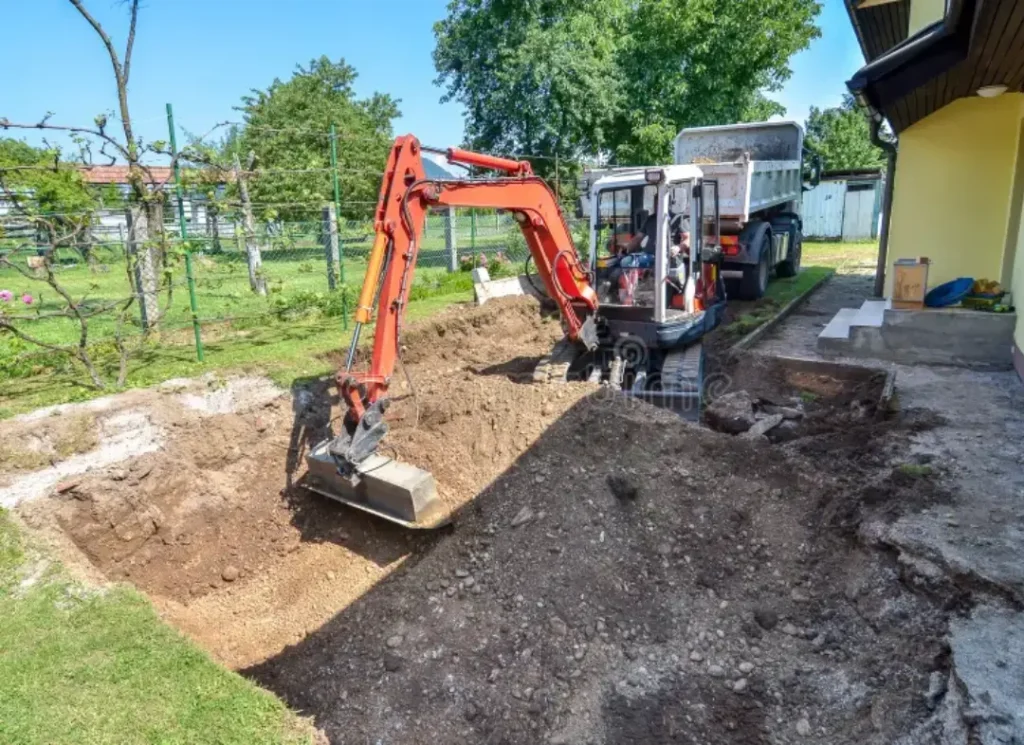 Mini excavator yard digging